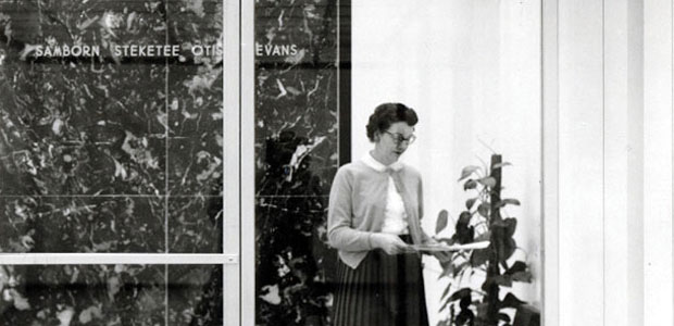 SSOE employee in lobby - historic image